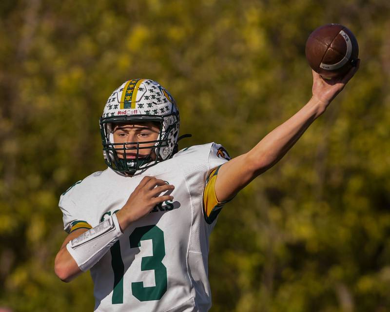 Coal City's Connor Henline (13) passes the ball while taking on Montini Catholic during the 4A quarterfinals game on Saturday Nov. 15, 2025, held at Montini Catholic High School.