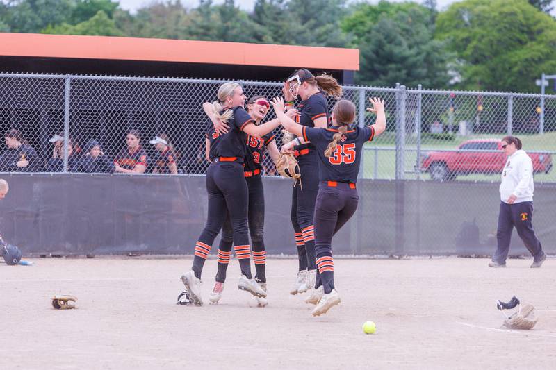 St. Charles East celebrates the win over Schaumburg  at the Class 4A St. Charles East Regional Final on Friday, May 22,2026 in St. Charles.