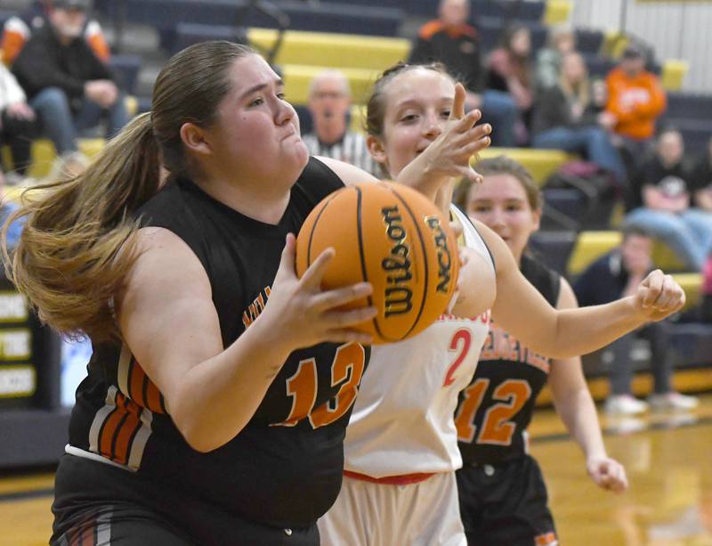 Polo's Laney Mandrell (2) and Milledgeville's Olivia Wooden (13) fight for a rebound on Saturday, Jan. 24, 2026 at Polo High School.