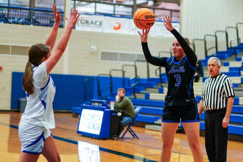 St. Charles North's Brianna Buono (3) shoots a 3-pointer against Geneva during a game at Geneva High School on Thursday, Dec. 4, 2025.