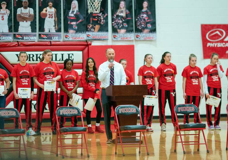 Yorkville's Athletic Director Luke Engelhardt talks to the crowd during the 13th annual Hoops 4 Hope Communities vs. Cancer basketball event at Yorkville High School on Saturday, Jan 28, 2023.