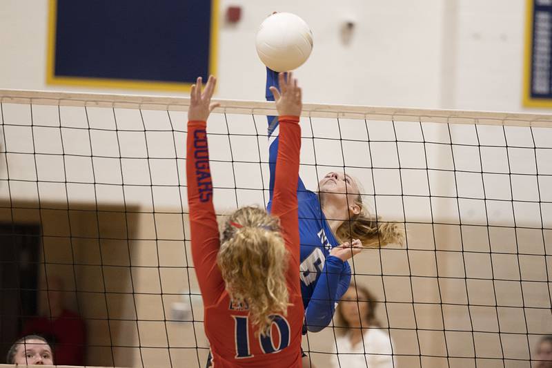 Newman’s Jess Johns spikes the ball in game one Wednesday, Oct. 26, 2022 in the semifinal volleyball match against Eastland.