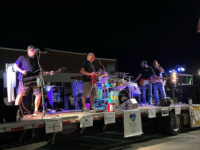 The band Free Beer and Chicken performs Saturday, Sept. 23, 2023, in downtown Mendota during Reimagine Mendota's Street Party.