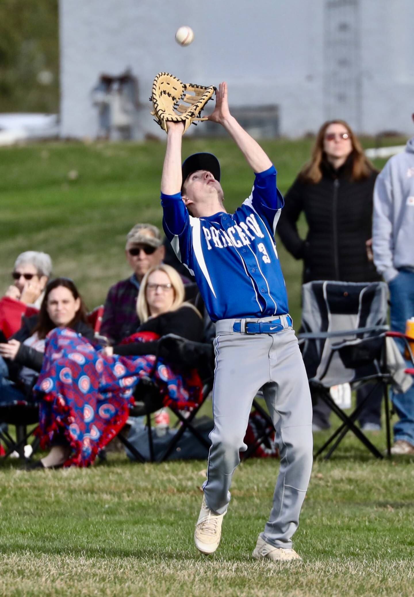 Princeton first baseman Ean Compton camps under a pop fly Monday against Hall.
