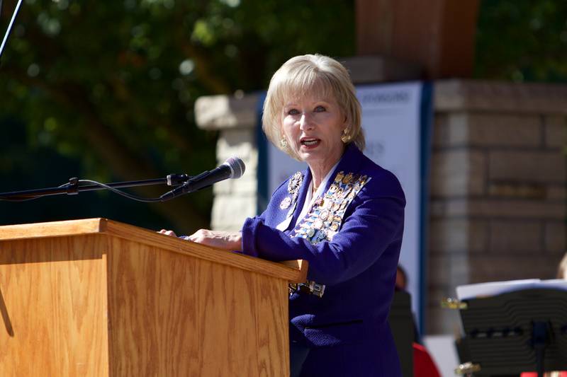 Marria Blinn National Chair of The Flag of the United States of America National Committee speaks at the Flag Day Monument opening ceremony's at Patriot's Park on Sunday, Oct 1,2023 in Batavia.