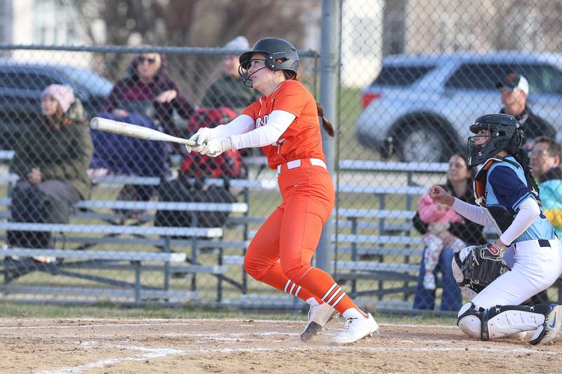 Lincoln-Way West’s Abby Brueggmann drives in a run against Plainfield South on Tuesday, March 24, 2026 in Plainfield.