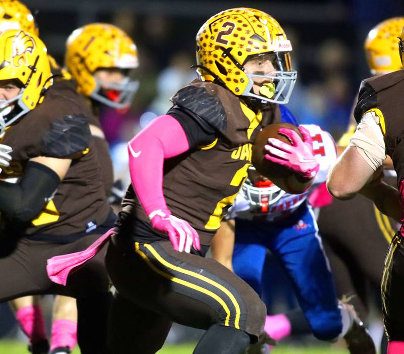 Jacobs’ Caden DuMelle runs the ball against Dundee-Crown in varsity football  at Jacobs High School in Algonquin on Friday, Oct. 10, 2025.