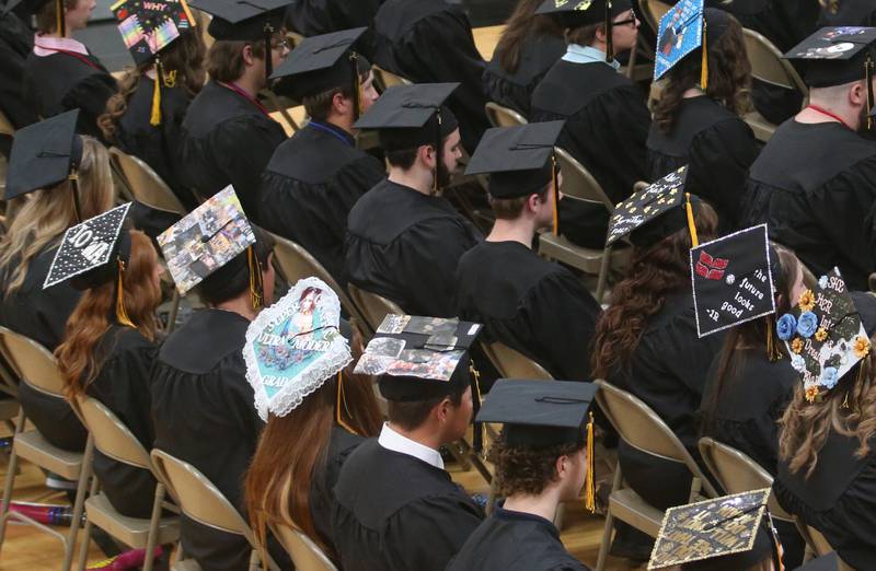 Putnam County High School Class of 2025 graduates ware decorative caps during the 59th annual Commencement on Sunday, May 18, 2025 in R.M. Germano gymnasium.
