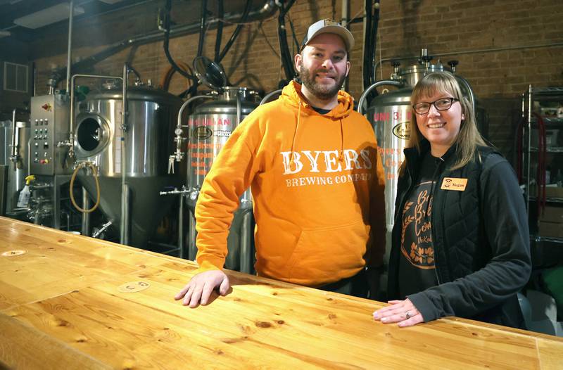 Steve and Megan Byers, co-owners of Byers Brewing Company, in the brewing area Friday, Jan. 6, 2023, at the brewery and taproom in DeKalb. Byers is planning an expansion of its operations to include another location  216 N. Sixth St. in DeKalb for production only.