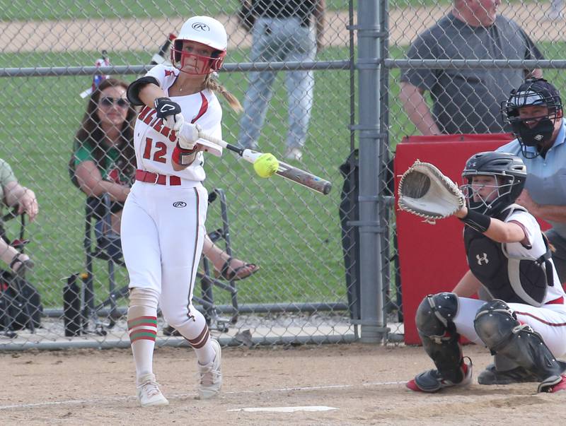 L-P's Taylor Martyn smacks a triple against Ottawa on Friday, April 14, 2023 at Ottawa High School.