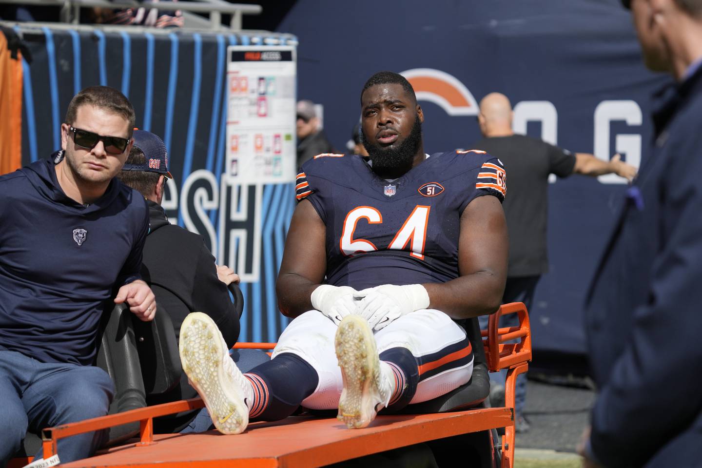 Chicago Bears guard Nate Davis is carted off the field during the first half against the Minnesota Vikings, Sunday, Oct. 15, 2023, in Chicago.