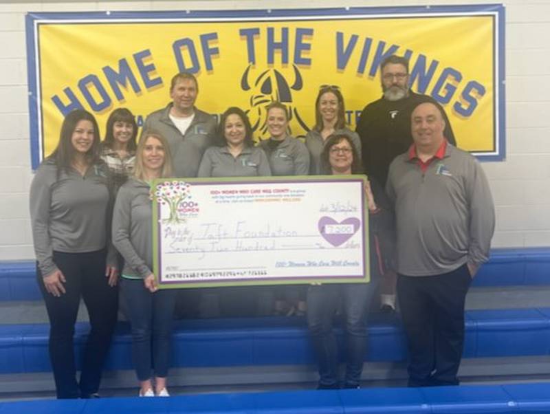 Christine Jelinek, director of Taft Foundation, was presented the checks by members of 100+ WWC of Will County. Taft Foundation is a non-profit organization that raises funds to support educational programs, activities, technology and programming for the students at Taft Grade School District 90 in Lockport.