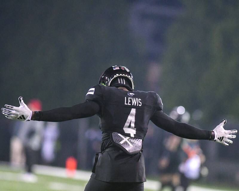 Northern Illinois Huskies defensive end Kenji Lewis(4) celebrates the win over Akron, while being bowl eligible on Wednesday Nov. 13, 2024, held at Huskie Stadium in DeKalb.