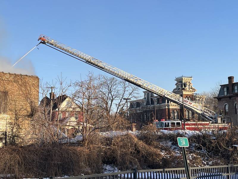 Joliet firefighters battle a fire at a commercial building fire at 1 S. Eastern Ave., on Thursday, Jan. 29, 2026. Crews from five stations were at the scene.