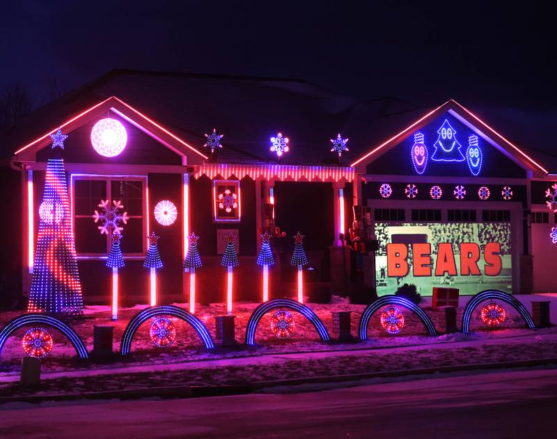 A Chicago Bears light show put together by Tim Caravia and his family plays Friday, Jan. 16, 2025, at his home on Dustin Drive in Sycamore. The show will run from 5:30 to 9:00 p.m. most days until the Bears season ends.