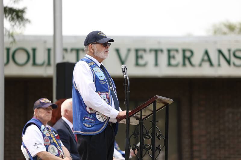 John Connon Commander, USS Chicago Base, makes opening remarks at a special Flag Day ceremony dedicating a memorial to remember the 28 World War II Submarines that traveled through Joliet on their way to the Pacific theater in Bicentennial Park on Wednesday, June 14, 2023 in Joliet.