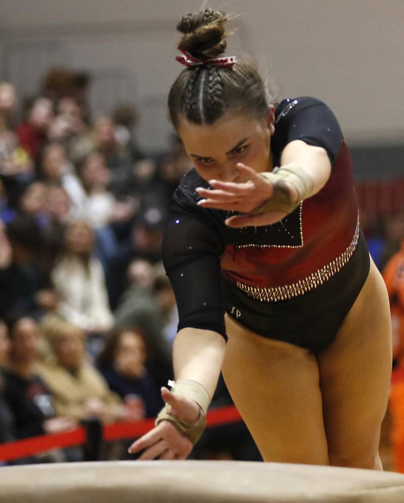 Prairie Ridge’s Alexis Vallee competes on the vault during the IHSA Mundelein Gymnastics Sectional on Feb. 13, 2025, at Mundelein High School.