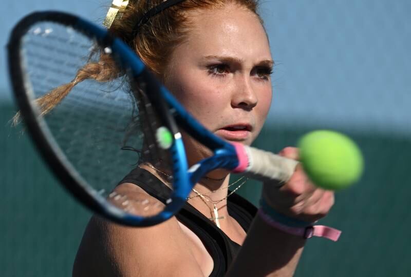 Plainfield North's Jessica Kovalcik hits a smash during championship match of the girls state tennis tournament at Hersey High School on Saturday, Oct. 26, 2024 in Arlington Heights.