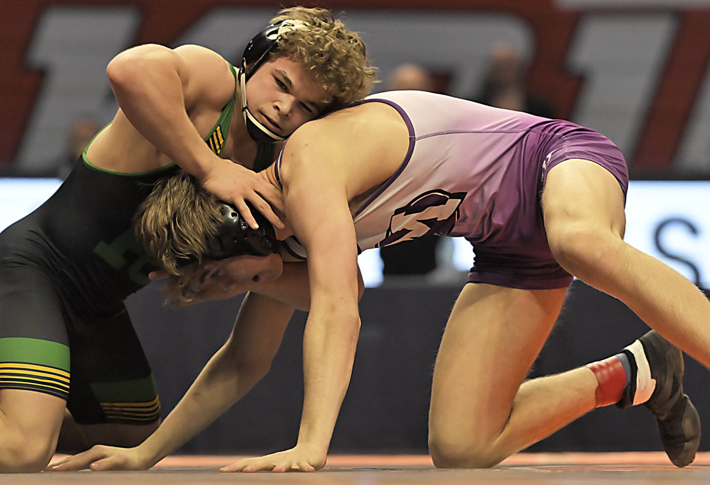 Providence Catholic's Justus Heeg controls Brock Ross of Mascouta in the Class 2A 150-pound final at the IHSA boys state wrestling championships at the State Farm Center in Champaign on Saturday, Feb. 22, 2025.