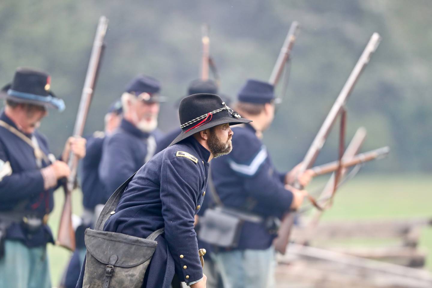 Union Civil War re-enactor soldiers take part in a battle scene during Princeton's Shadow of the Blue and Gray event on Saturday, Oct. 9, 2021.