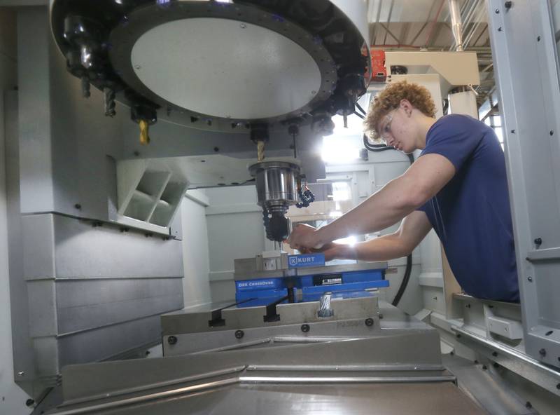 Area Career Center student Christian Konczak uses a TRAK TMC 5 milling machine designed for precision work in a toolroom environment, in the machine shop classroom on Tuesday, Feb. 11, 2025 at La Salle-Peru Township High School. The TRAK Machine Tools company donated two machines totaling $105,000 to the Area Career Center last fall. February is Career and Technical Education (CTE) month. The school celebrated with Spirit Week at the Lasalle Peru Area Career Center. The program helps students and staff rally around a common cause: building a sense of community and belonging. “This can strengthen school spirit and create a more cohesive environment,” said ACC Director Dr. Shane Lange. CTE is important because it offers students a unique blend of academic knowledge and practical skills, preparing them for both further education and the workforce. CTE Month showcases the programs the ACC offers and celebrates the amazing things the students and faculty are doing in their classrooms. Among activities happening this month, the ACC is promoting CTE Spirit Week dress-up days with clothing themes for each day. “Our spirit week apparel creates curiosity from the community and other students,” Lange said.