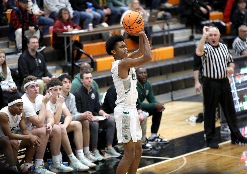 Glenbard West's TJ Williams shoots the ball during a Class 4A St. Charles East Sectional semifinal against Glenbard East on Tuesday, March 4, 2025 in St. Charles.