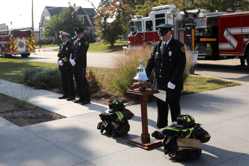 McHenry Township Fire Protection District firefighter Ryan Moore rings the fire bell during a September 11 Remembrance Ceremony on Sept. 11, 2025, at Veterans Park in McHenry.