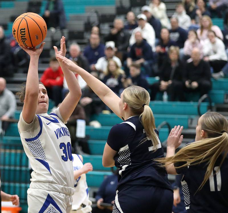 Geneva's Keira McCann shoots the ball over St. Viator's Ava Garcia during the IHSA Class 3A Woodstock North Supersectional girls basketball game on Monday, March 2, 2026, at Woodstock North High School.