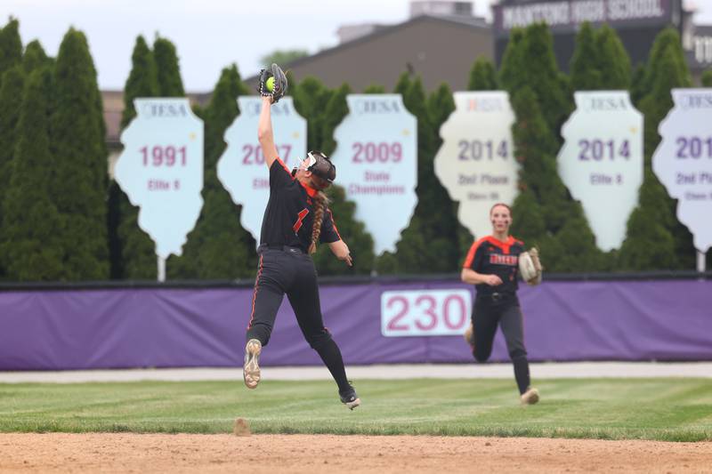 Beecher's Carmela Irwin makes a leaping catch toward the outfield during Beecher's 14-6 victory over Manteno in the Class 2A Manteno Regional championship on Friday, May 22, 2026.