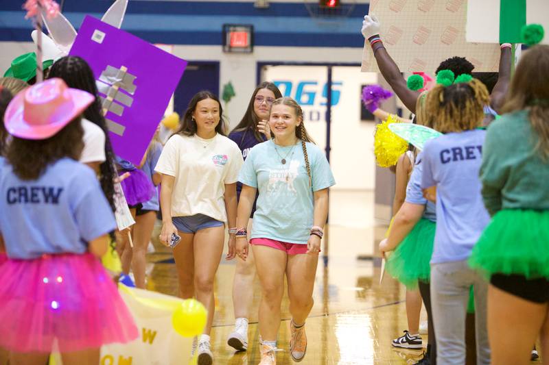 Downers Grove South freshmen enter the gym at the Mustang Mad Dash orientation on Saturday Aug.10, 2024 in Downers Grove.