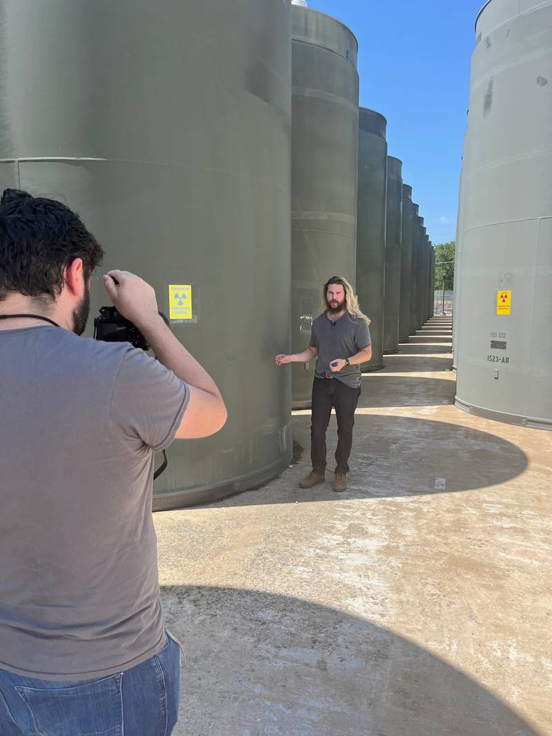 Kyle Hill, on camera in more ways than one, discusses the storage of nuclear waste at Dresden Generating Station for his video.