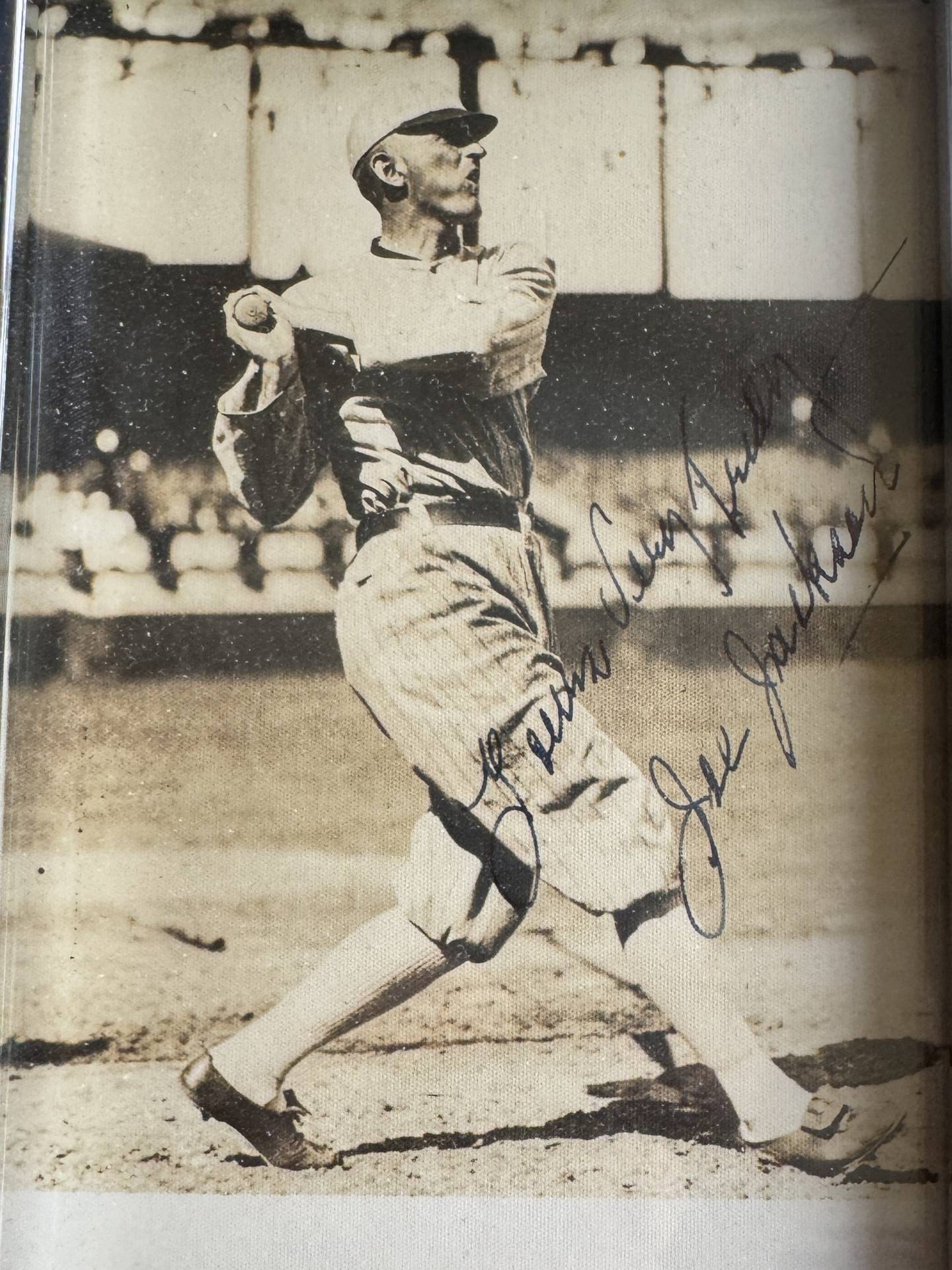 A photo of Shoeless Joe Jackson with his signature signed by his wife. Jackson was illiterate, so most signatures of his were typically signed by his wife.