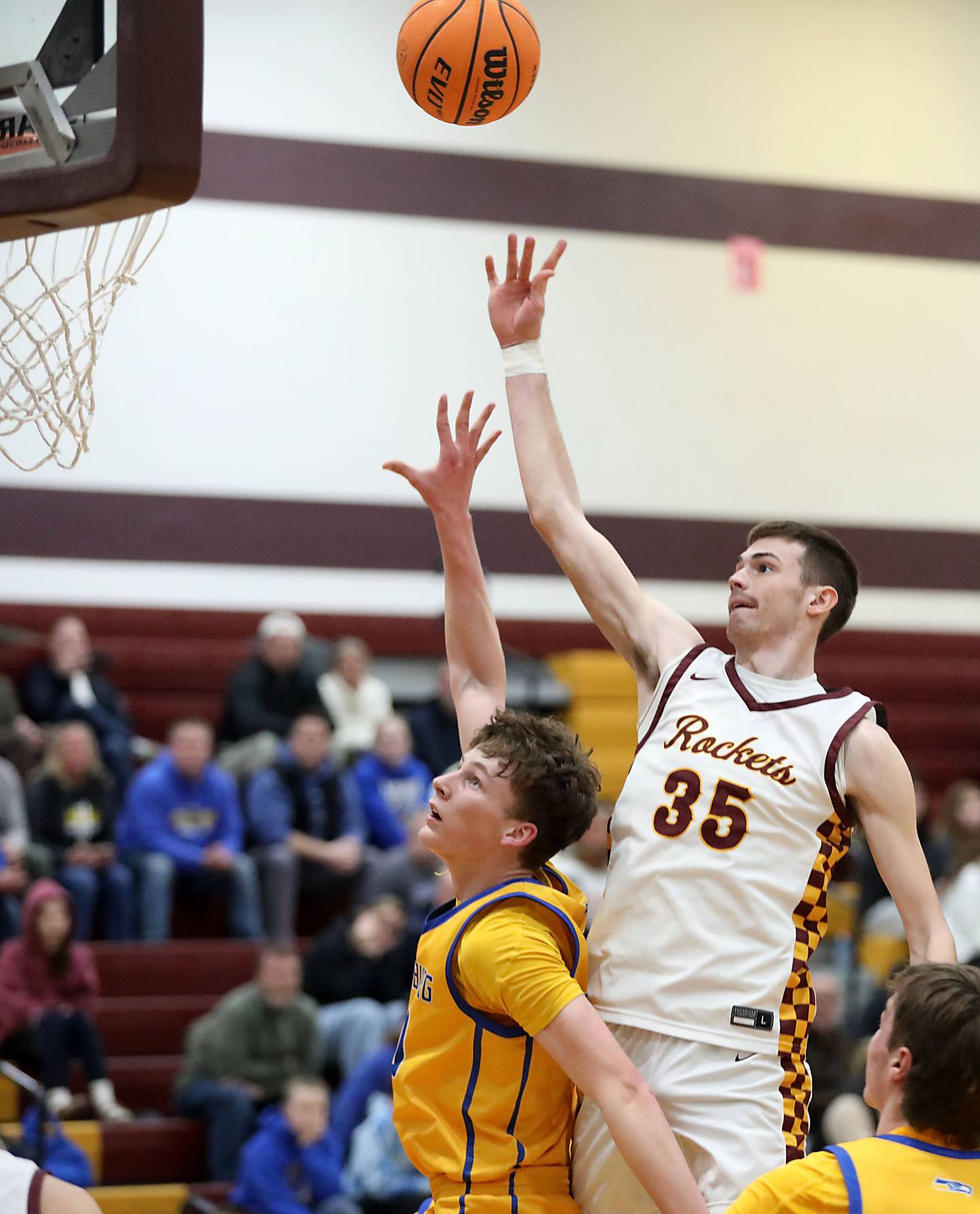 Richmond-Burton's Jace Nelson shoots the ball over Johnsburg's Josh Kaunas during a Kishwaukee River Conference boys basketball game on Tuesday, Jan. 27, 2026, at Richmond-Burton High School.