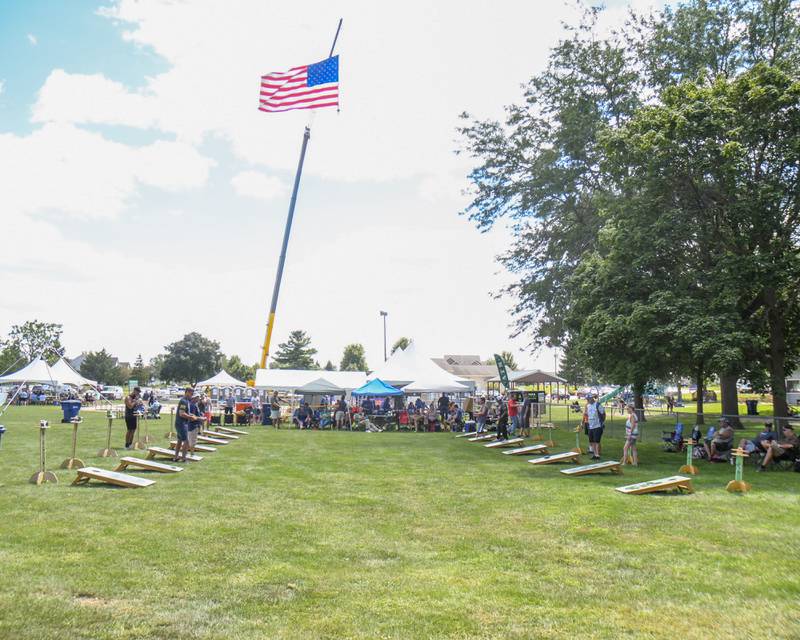 A bags tournament takes place as one of many family-friendly games during Cortland Summerfest held at Cortland Community Park on Saturday, Aug. 10, 2024.
