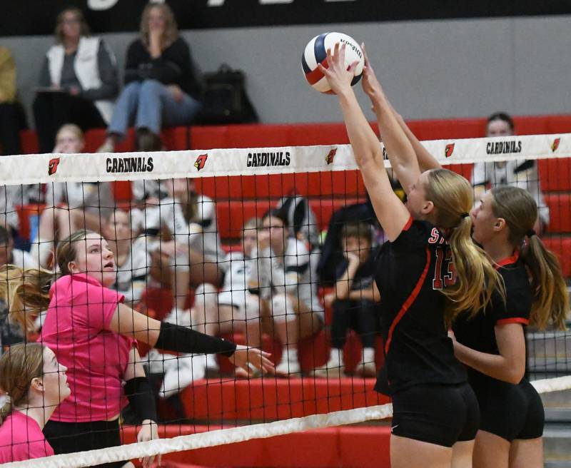 Fulton's Hailey Smithers (13) and Brianne Brennan (5) block a spike by a Stillman Valley player at the Stillman Valley Tournament on Saturday, Oct. 25, 2025 at Stillman Valley High School.