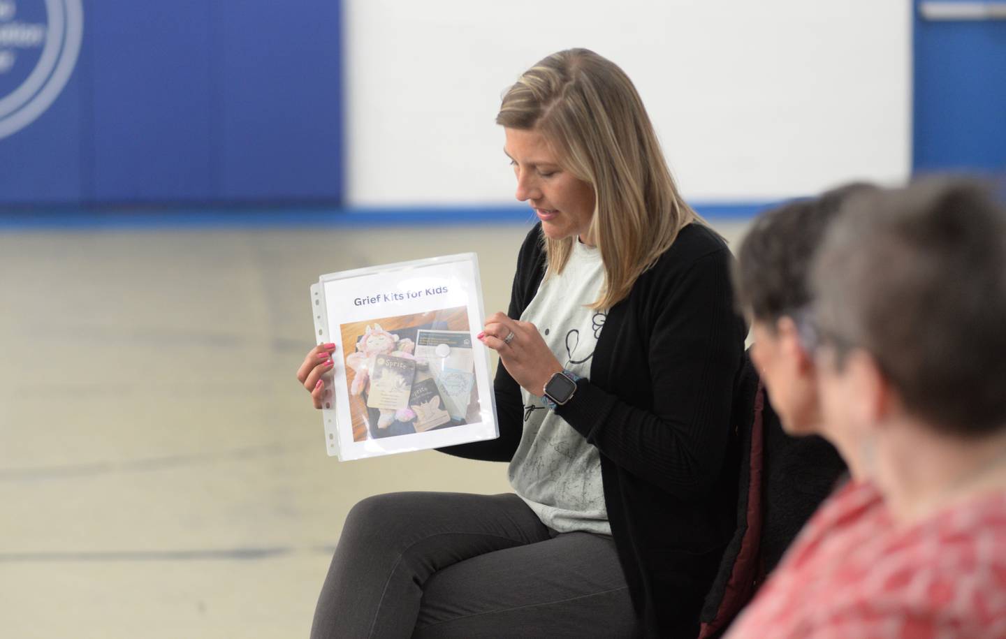 Marie Tuten of the Forrestville Valley School District, talks about how her district will use grant money received from The Maggie & Amos Foundation on Thursday, Feb. 15, 2024. She will be using funds to purchase materials to create grief kits for students in her school district.