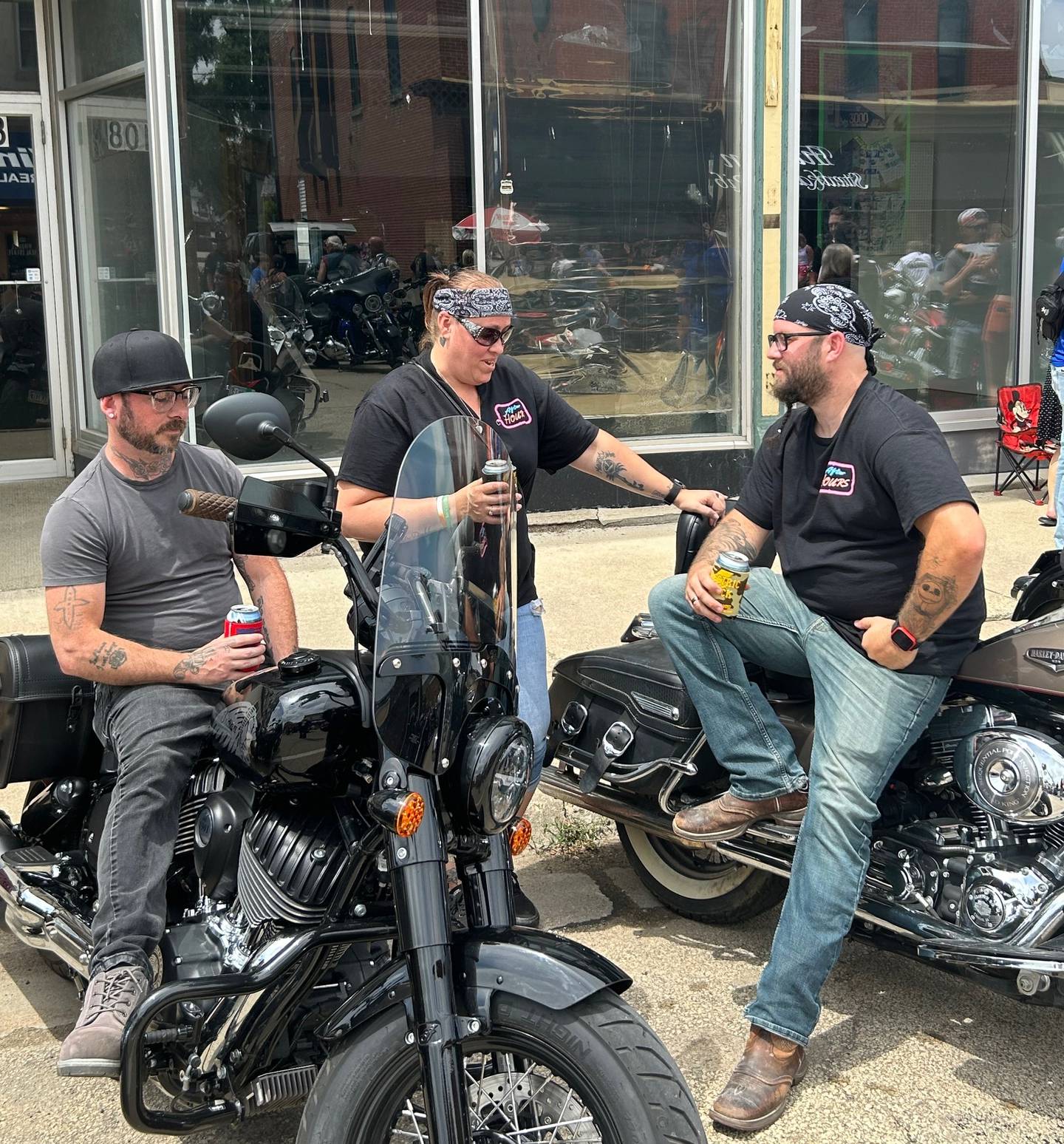 Bobby Lucy (from left), Jessi Everson and Steven Goff get ready for the Blessing of the Bikes on Sunday, June 2, 2024, in downtown Fulton.