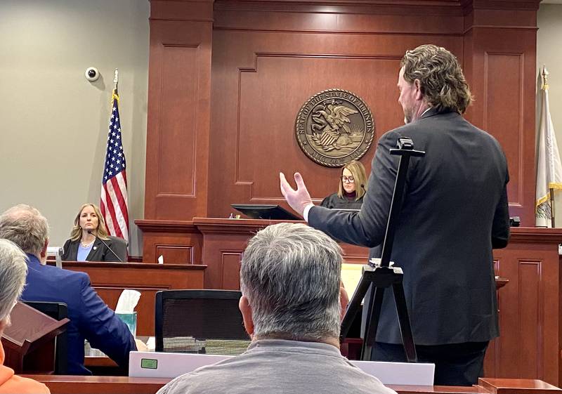Assistant State's Attorney Scott Schwertley (right), questions former DeKalb Police Detective Kelly Sullivan (left) as she testifies about evidence collection during Day 2 of the double murder trial of Jonathan D. Hurst on Friday, Jan. 24, 2025, at the DeKalb County Courthouse in Sycamore. The trial is presided over by Circuit Court Judge Marcy Buick (center). Hurst, formerly of Chicago, is charged with murder in the 2016 killings of Patricia Wilson and Robert Wilson.
