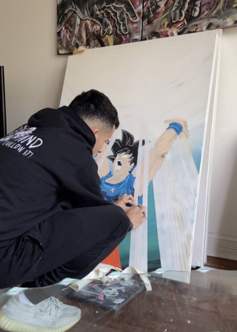 Francisco "Frankie" Contreras working on a Dragon Ball Z themed piece.