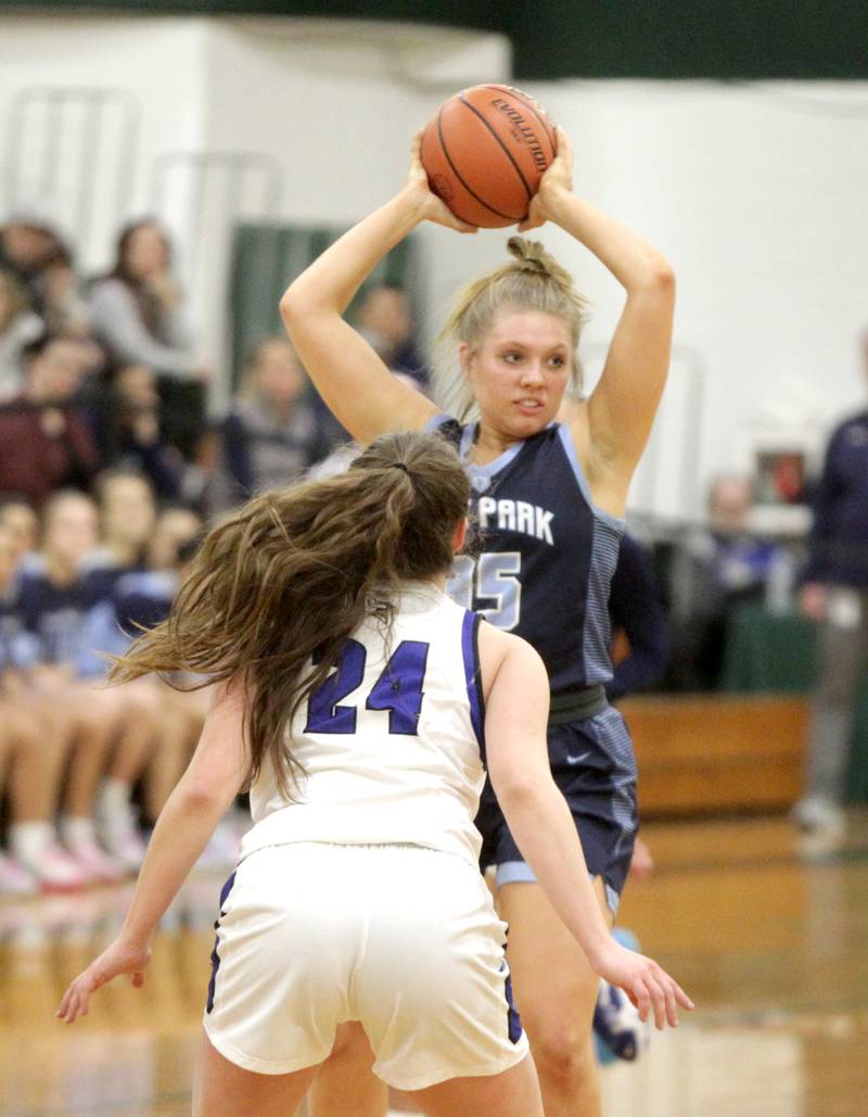 Lake Park’s Grace Cord looks to pass the ball during a Class 4A Glenbard West Sectional semifinal game against Geneva in Glen Ellyn on Tuesday, Feb. 21, 2023.