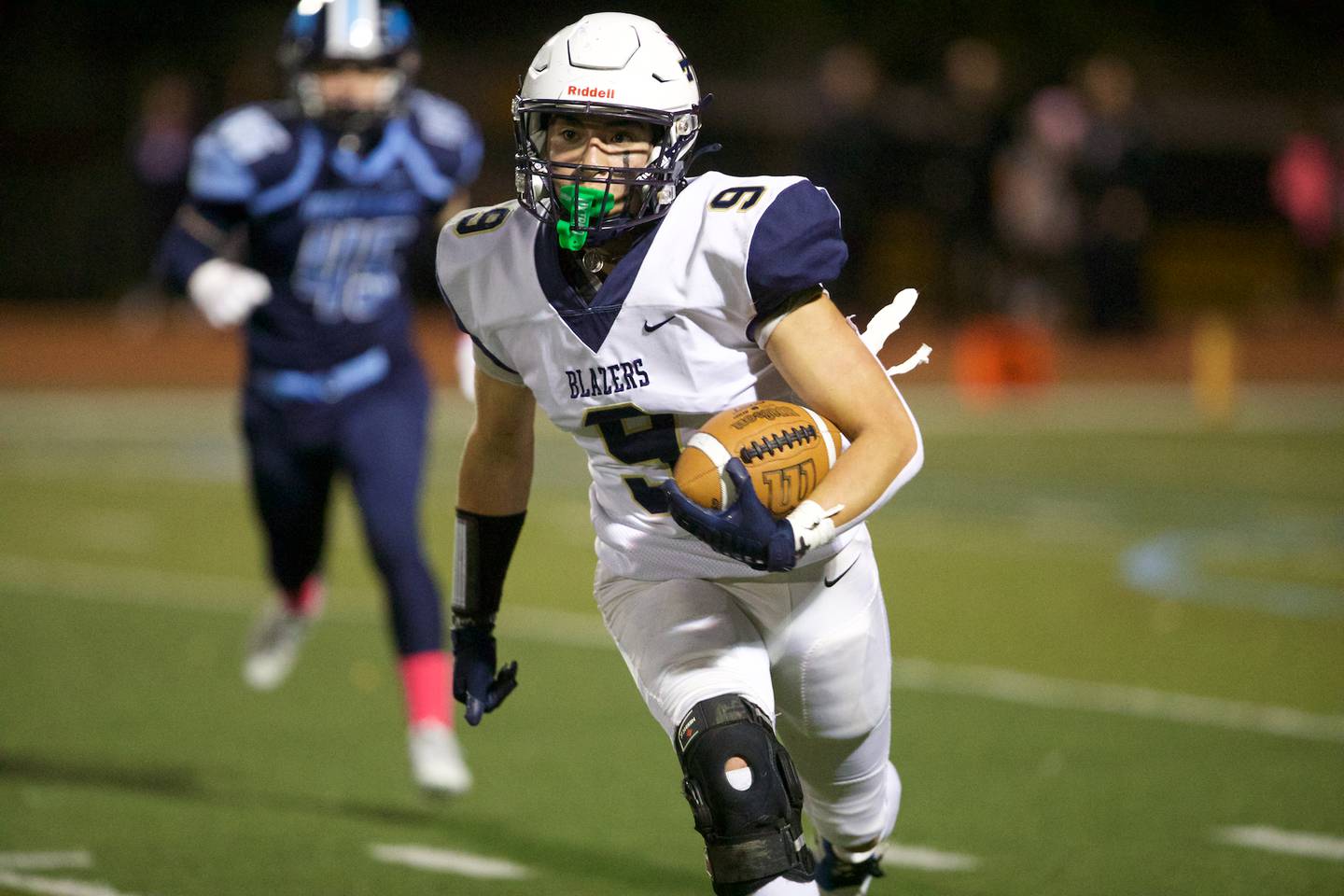 Addison Trail's Noah Cruz carries the ball against Downers Grove South's on Friday, Oct.20,2023 in Downers Grove.