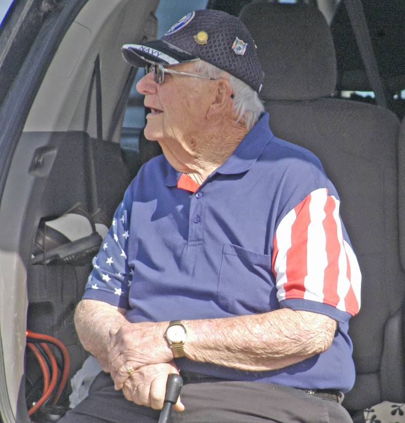 Navy veteran Jim Eshleman watches the Rock Falls ceremony. Rock Falls American Legion Post 902 hosted a ceremony at Lower Dam Park in Rock Falls. The event took place Monday, May 26, 2025.
