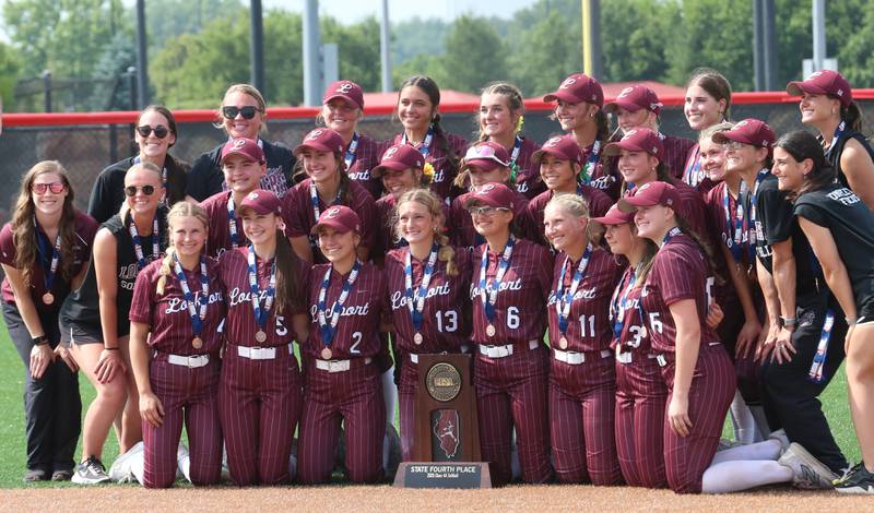 Members of the Lockport softball team pose with the Class 4A fourth place trophy after falling to Oak Park River Forest on Saturday, June 14, 2025 at the Louisvile Slugger Complex in Peoria.