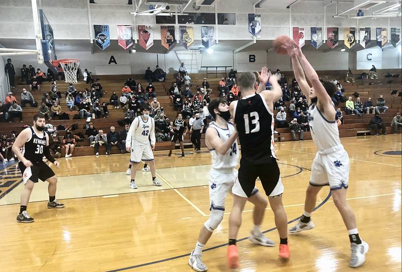 Princeton's Grady Thompson (left) and Jackson Dressler apply the defensive pressure on Kewanee's Jordan Johnson Tuesday night at Prouty Gym. The Boilermakers won 50-40.