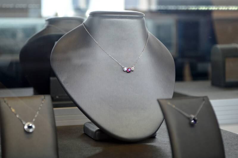 A diamond and ruby necklace sits in a display case on Saturday, Nov. 2, 2024, in Brooks Jewelers, located in downtown Oregon. The store's owner, Jen Brooks, made the necklace using lab-created gems.
