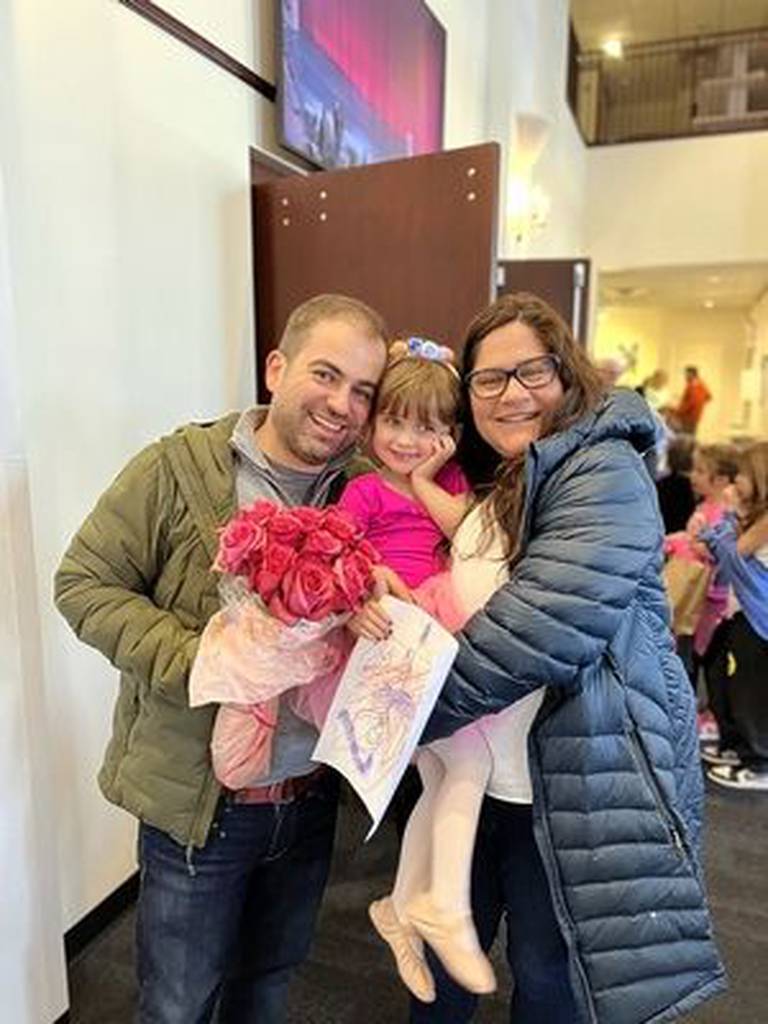 Liz Turnipseed, right, was shot in the pelvis while attending the July 4 Highland Park parade with her husband, Ian, left, and daughter Sonia.