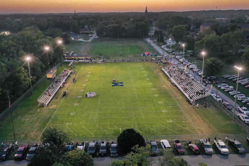 The sun sets over Gould Stadium on Friday, Sept. 26, 2025 in Ottawa. Marquette hosted St. Bede in football.