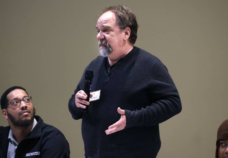 District 428 School Board candidate Jim Mitchell speaks Thursday, March 20, 2025, during the DeKalb Area Rental Association and DeKalb Area Builders Association School Board Candidates Forum at Faranda's Banquets in DeKalb.