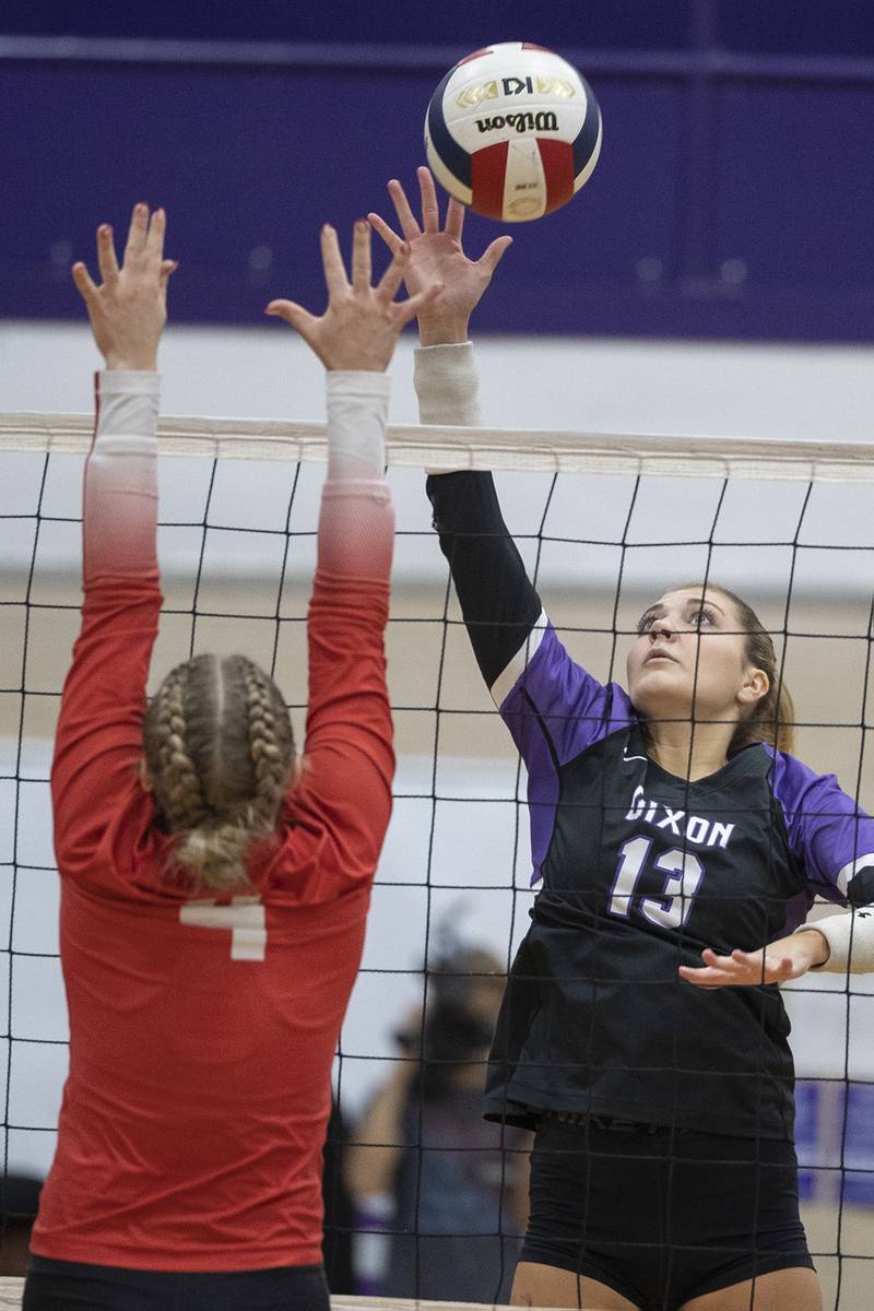 Dixon’s Solis Thompson plays the ball over the net against Oregon’s Shaylee Davis Thursday, Oct. 9, 2025.