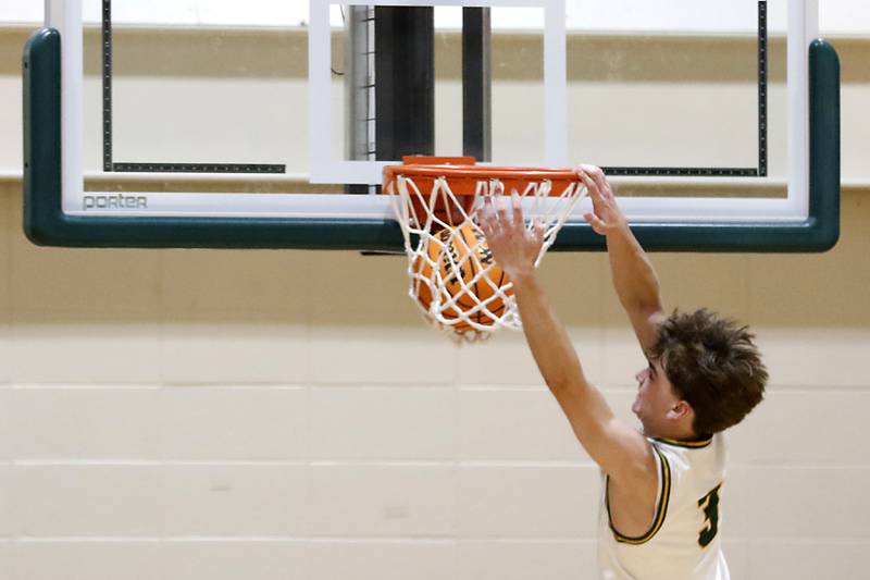 Crystal Lake South's Nick Stowasser dunks the ball during a Fox Valley Conference basketball game against Burlington Central on Tuesday, Jan. 28, 2025, at Crystal Lake South High School.
